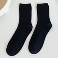 Classic ribbed crew socks for women in pure black cotton blend with elastic cuffs - Black