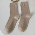 Oatmeal color waffle knit crew socks for women with vertical ribbed texture detail - Milk Tea