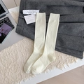 Chic cream white wool knee high socks with soft knitted texture for winter warmth - Cream