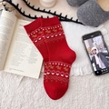 Calze rosse in cotone con motivo jacquard a cervo marrone in accogliente stile invernale - Rosso