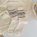 Calze di lana color crema con motivo jacquard di cucciolo blu in stile vintage - Taglia unica / crema