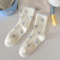 Thick plush women socks in beige with blue polka dots and a soft fuzzy texture - Blue Polka Dot
