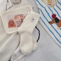 Creamy white plush socks featuring cute bear embroidery and decorative ruffle cuffs - Little White Dog (White Dog One Pair)