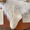 Calze spesse in lana beige screziato con fiocco azzurro per il massimo calore invernale - Bianco Crema