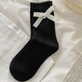 Chaussettes noires en coton avec nœuds en dentelle blanche et pendentifs décoratifs - Taille unique / Noir