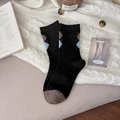 Calze di lana a rombi nere con motivi blu e marroni su sfondo in maglia bianca - Taglia unica / Nero