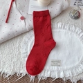 Chaussettes vintage rouge foncé avec motifs d'étoiles en relief et bords côte - Taille unique / Motif Étoile - Rouge