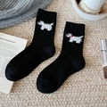 Cute black wool socks for women featuring a 3D plush puppy pattern and cozy knit texture - Black