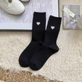 Classic black ribbed crew socks featuring white flocked heart embroidery for women - Black