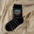 Chaussettes rayées noires avec petite poche latérale et étiquette en métal doré - Noir