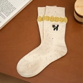 Calze beige in cotone con puntini colorati e ricamo di gatto nero stile college - Bianco sporco con bordo giallo