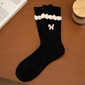 Speckled black mid-calf sock with cat embroidery and white frilled lace cuff detail - Black