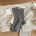 Thick dark grey knitted mid-calf socks with colorful specks and ribbed texture - Gray