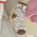 Thick coral fleece socks in cream and brown with a bow and cute bear label - One Size / Beige