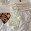 Cream knit mid-calf socks with cable texture, lettuce edge, and polka dot bow detail - One Size / White Bow Pair