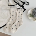 Calze beige con motivi a fiocco nero e bordo a volant in morbido stile a maglia - Farina d'Avena (1 Paio)
