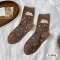 Japanese style coffee brown socks featuring plush white clouds and star patterns - Brown