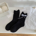Chaussettes noires en coton avec nœud à carreaux bleu et blanc et bords volantés - Taille unique / Noir