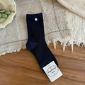 Dark blue cotton crew socks featuring 3D bow texture and a decorative white button detail - Navy Blue