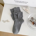 Gray layered mid-calf socks with contrast stripes and ribbed cuffs on white surface - Solid Color / Light Gray