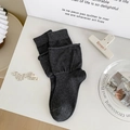 Dark gray ribbed mid-calf knit socks featuring a stylish lettuce edge loose cuff design - Solid Color / Dark Gray