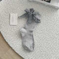 Sweet Lolita grey mid-calf socks featuring plaid bows and elegant ruffled lace trim - One Size / Light Gray