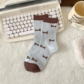 Light blue dachshund patterned crew socks with brown contrast heel and toe detail - One Size / All-over Dachshund (HT47)
