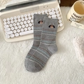 Gray dachshund crew socks with colorful stripes and cute dog embroidery on plush background - One Size / Striped Dog Head (HT47)