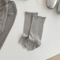Jambières légères en tricot gris clair avec un design uni et minimaliste pour femme - Taille unique / Gris clair
