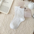 White crew socks with embossed bow jacquard and rolled cuffs in balletcore style - One Size / White