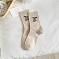 Beige cotton socks with cute grey dog and pink heart patterns in a cozy scene - One Size / Leash Dog (Beige)