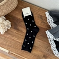 Ribbed mid-calf black socks with white cherry pattern and bow tie detail - Black Cherry