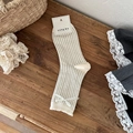 Cream white hollow knit crew socks featuring elegant silk bow and scalloped lace trim - Milky White Ribbon Bow