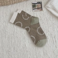 Calze in maglia marrone kaki con tallone verde e motivi a cerchio bianchi - Taglia unica / Marrone