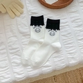 Black and white puppy socks with lace trim and Lucky Puppy print in cute Japanese style - White