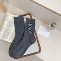 Dark grey crew socks featuring white lace trim and three black ribbon bows for women - One Size / Dark Gray