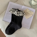 Women's crew socks in black with polka dot ruffled cuffs and ribbed cotton texture - One Size / Black (Black & White Polka Dot Ruffle)