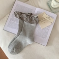 Grey knit rib socks with brown plaid ruffles on vintage book background - One Size / Light Gray (Brown Checkered Ruffle)