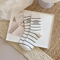 White crew socks with black stripes and a cute cartoon puppy design in college style - Striped Puppy Style