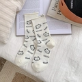 Creamy white mid-calf socks with cute cartoon cat patterns and decorative MEOW tags - One Size / White