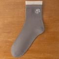 Men's dark beige crew socks featuring dual-tone cuff and cartoon skateboarder embroidery - Dark Gray