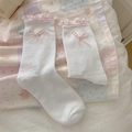 Witte sokken met roze strikjes en delicate ruches van kant in balletstijl - Roze