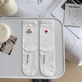 White cotton crew socks with red heart embroidery and I Love Paris text on the ankle - White