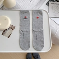Light gray cotton crew socks with red heart embroidery and Tom's family text - Light Gray