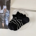 Calcetines tobilleros de mujer a rayas blancas y negras con malla y puños de canalé - Negro