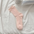 Light pink ribbed cotton mesh crew socks for women in a cozy minimalist home setting - Pink