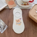 White low-cut invisible sock with a cute yellow bear cartoon print on wooden background - One Size / Bear
