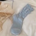 Light blue crew socks with vertical stripes, ruffled cuffs, and elegant white pearl detail - Blue Pearl