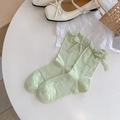 Light green mesh crew socks with chic bow accent and ruffled cuffs in sweet style - One Size / Light Green