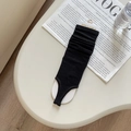 Fashionable black ribbed knit stirrup leg warmers for women in a chic trendy style - Black